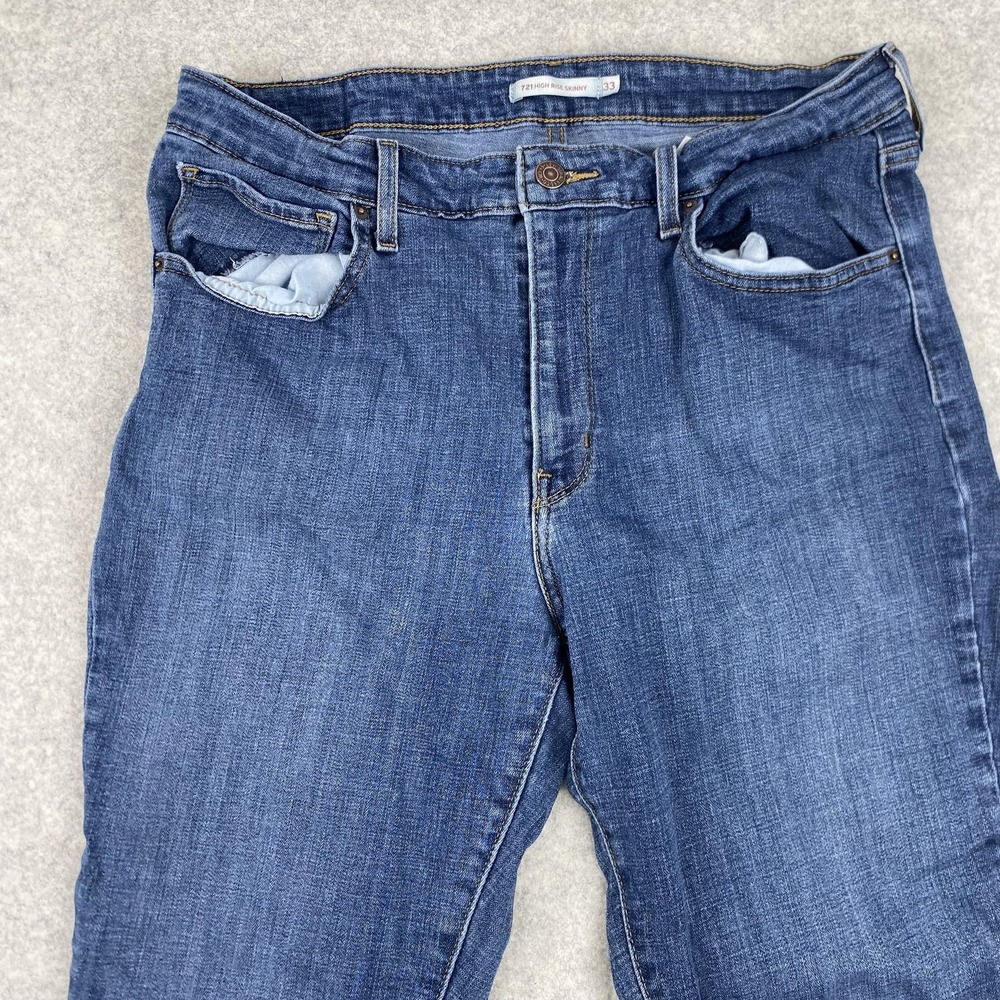 Levi's 721 High Rise Skinny Jeans Womens 33 (31x25) Blue Raw Hem Stretch Denim